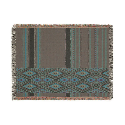 Woven blanket with geometric pattern on a white background